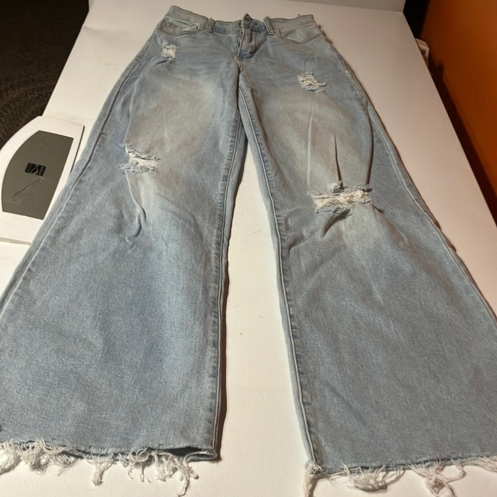 Vibrant Blue Flare Wide Leg Jeans with‎ Distressed Hem